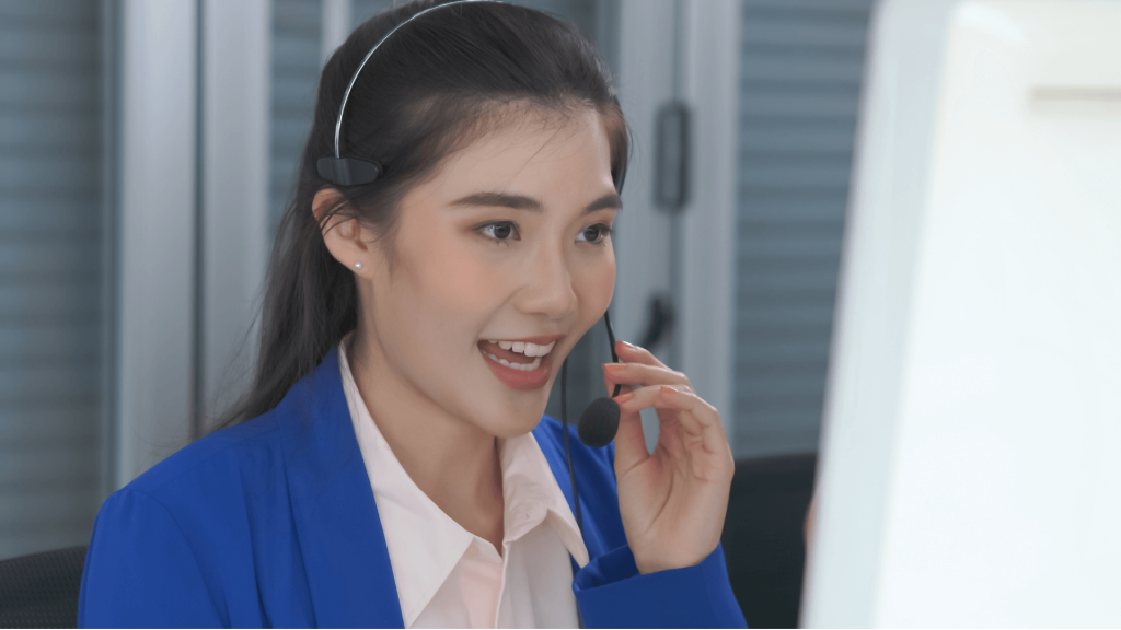 a businesswoman speaks on a headset