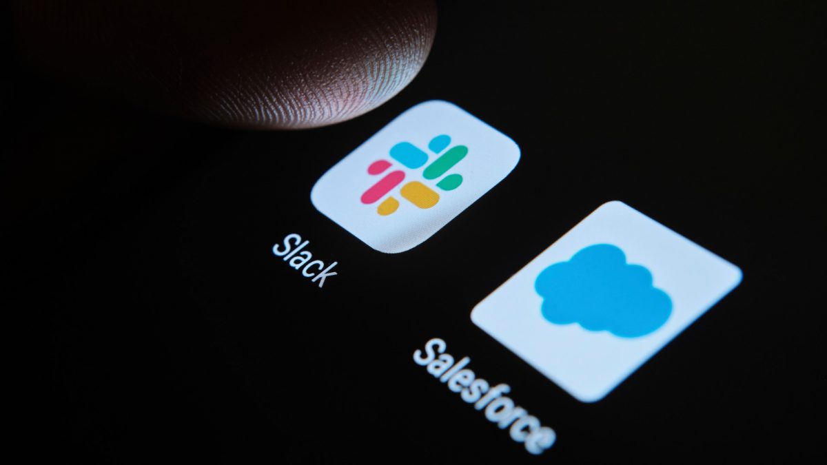 Salesforce and Slack apps display on a smartphone