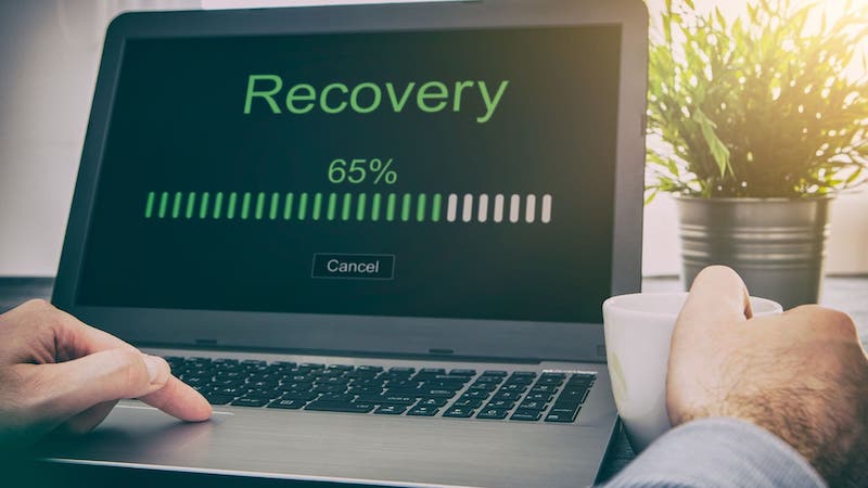 Close up of green progress bar as recovery screen loads | Organizing customer data in a CRM