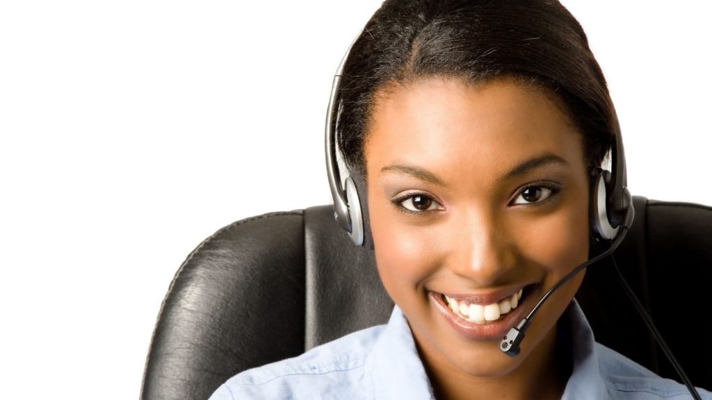 Salesperson Wearing Headset Smiles Over White Background | What is CRM Integration?