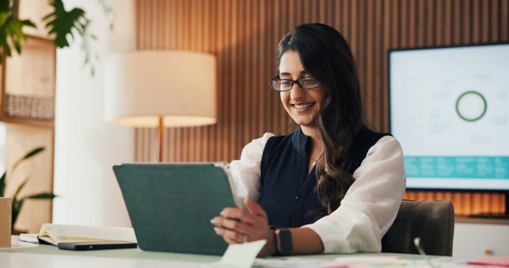 Woman reacting to exceeding KPI metrics | CRM statistics