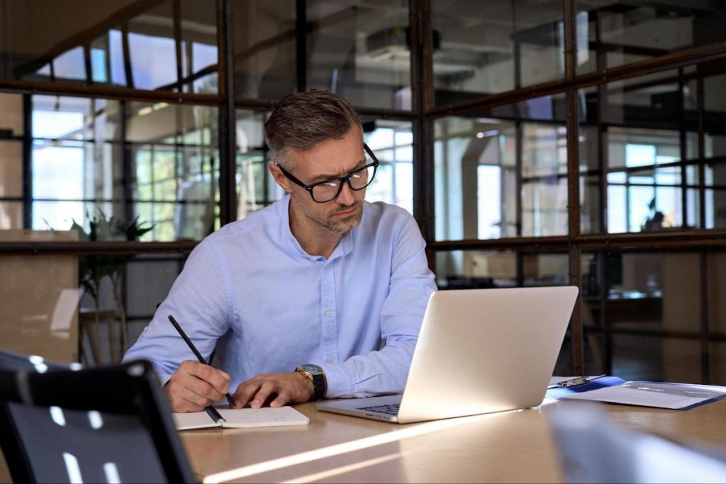 Man researching | Choosing a CRM