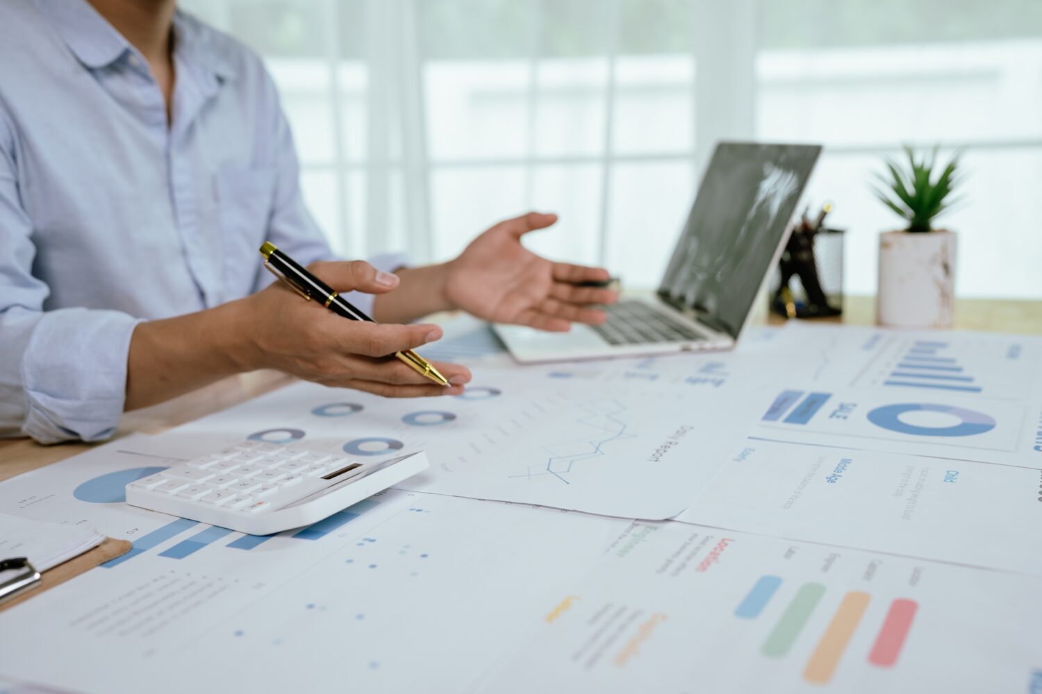 Manager reviewing charts | Einstein Activity Capture pricing